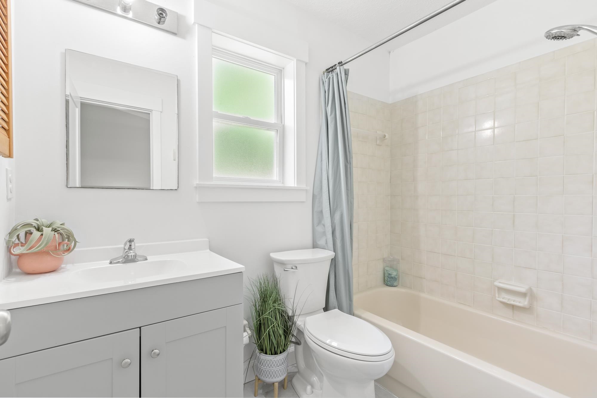 245 Mimosa Road St. Augustine, FL 32086 - Photo 15 of 33 a bathroom with a sink toilet and shower