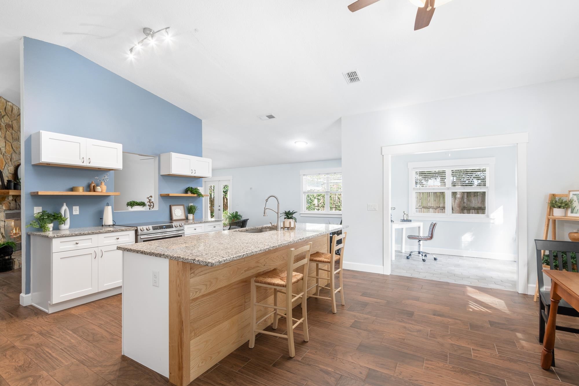 245 Mimosa Road St. Augustine, FL 32086 - Photo 22 of 33 a kitchen with appliances a table and chairs in it