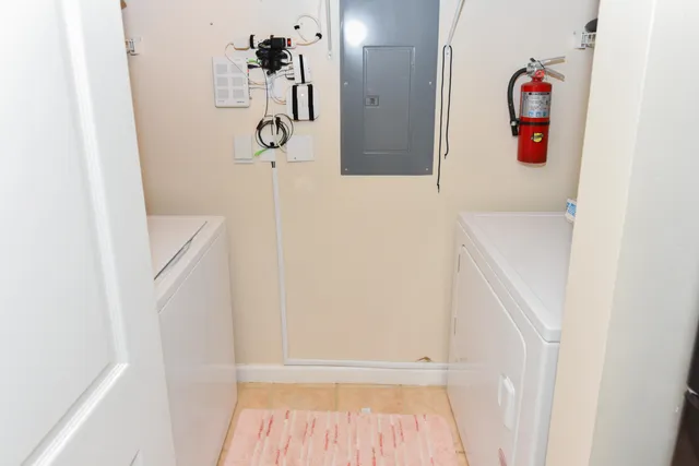 a bathroom with a bathtub and shower