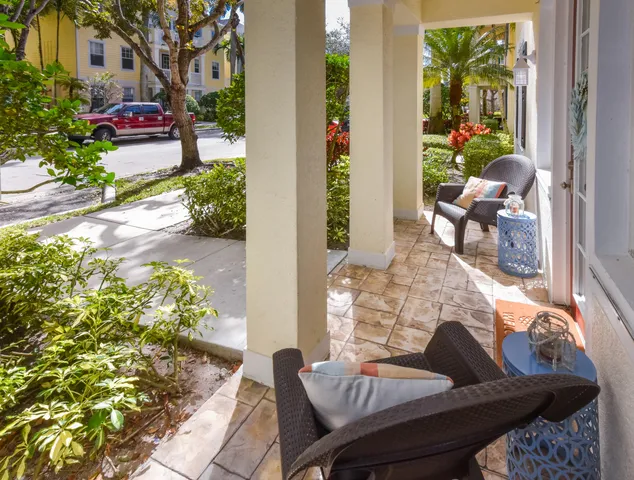 a view of a swimming pool with a patio