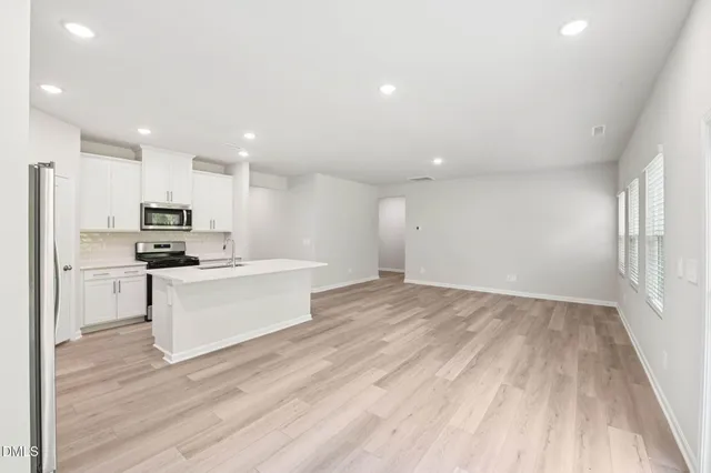 an empty room with windows