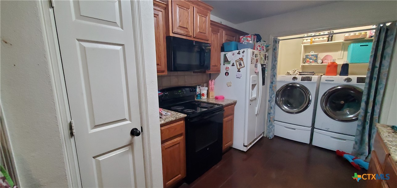 2201 Valley Forge Avenue Temple, TX 76504 - Photo 4 of 15 a utility room with dryer and washer