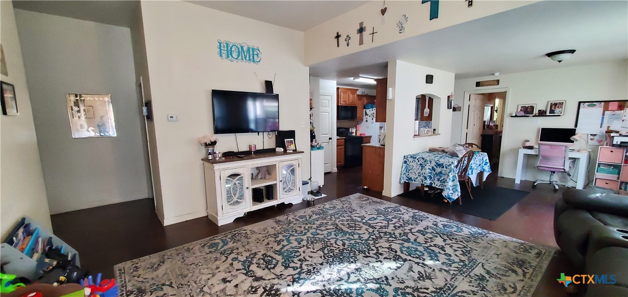 2201 Valley Forge Avenue Temple, TX 76504 - Photo 10 of 15 a bedroom with furniture and a rug