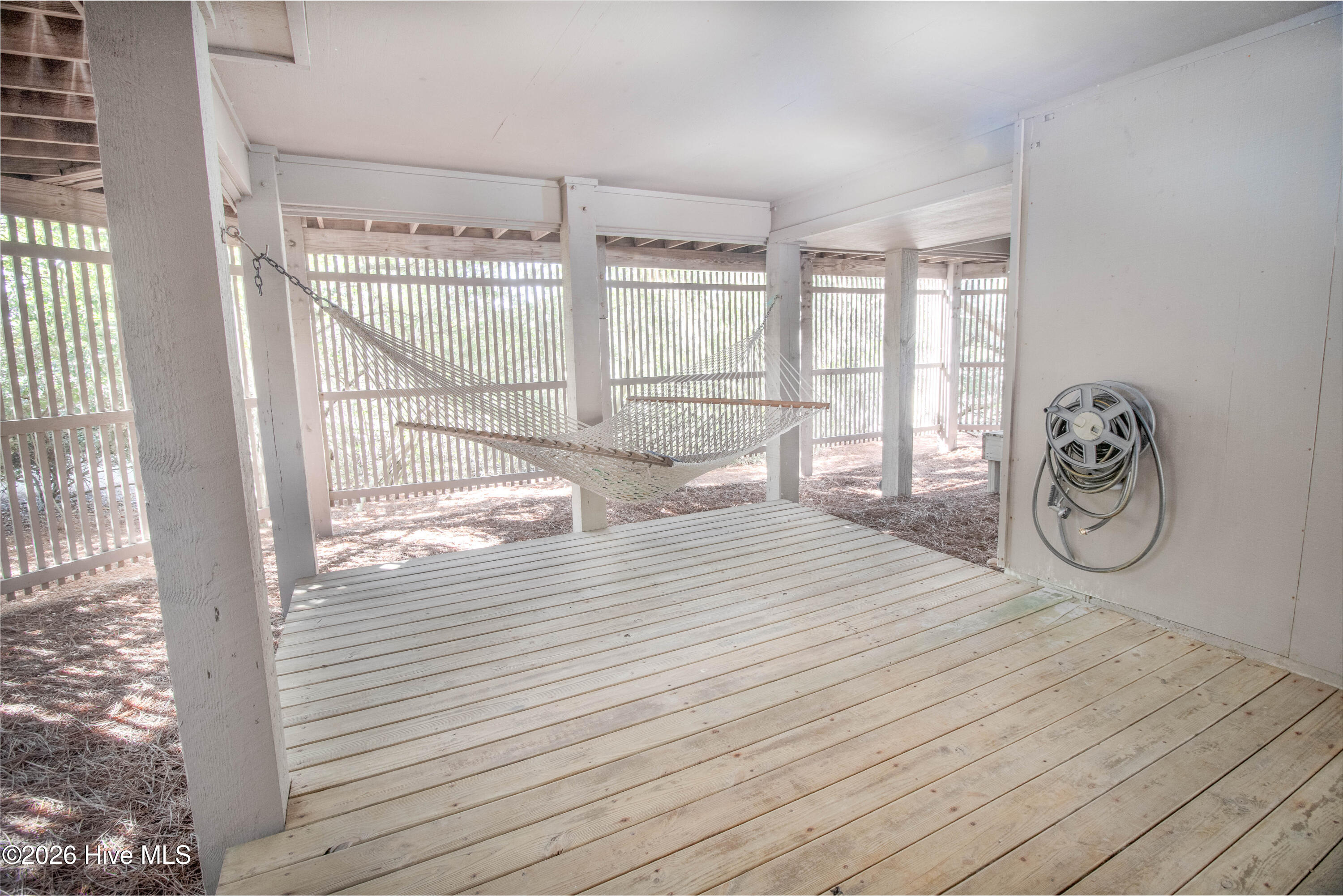 403 Beach Road North Wilmington, NC 28411 - Photo 22 of 26 Downstairs hammock area