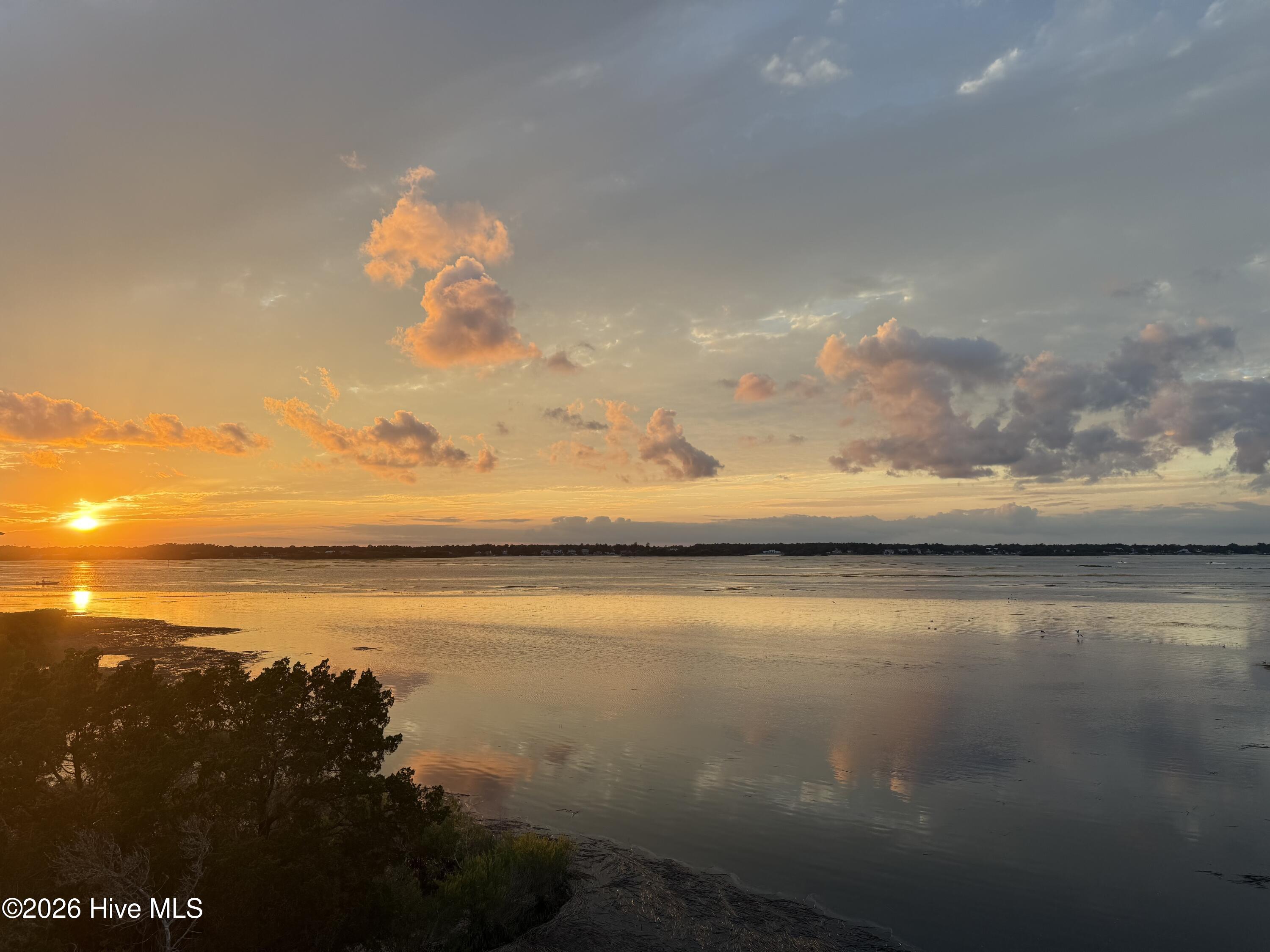 403 Beach Road North Wilmington, NC 28411 - Photo 25 of 26 High tide sunset picture from back deck