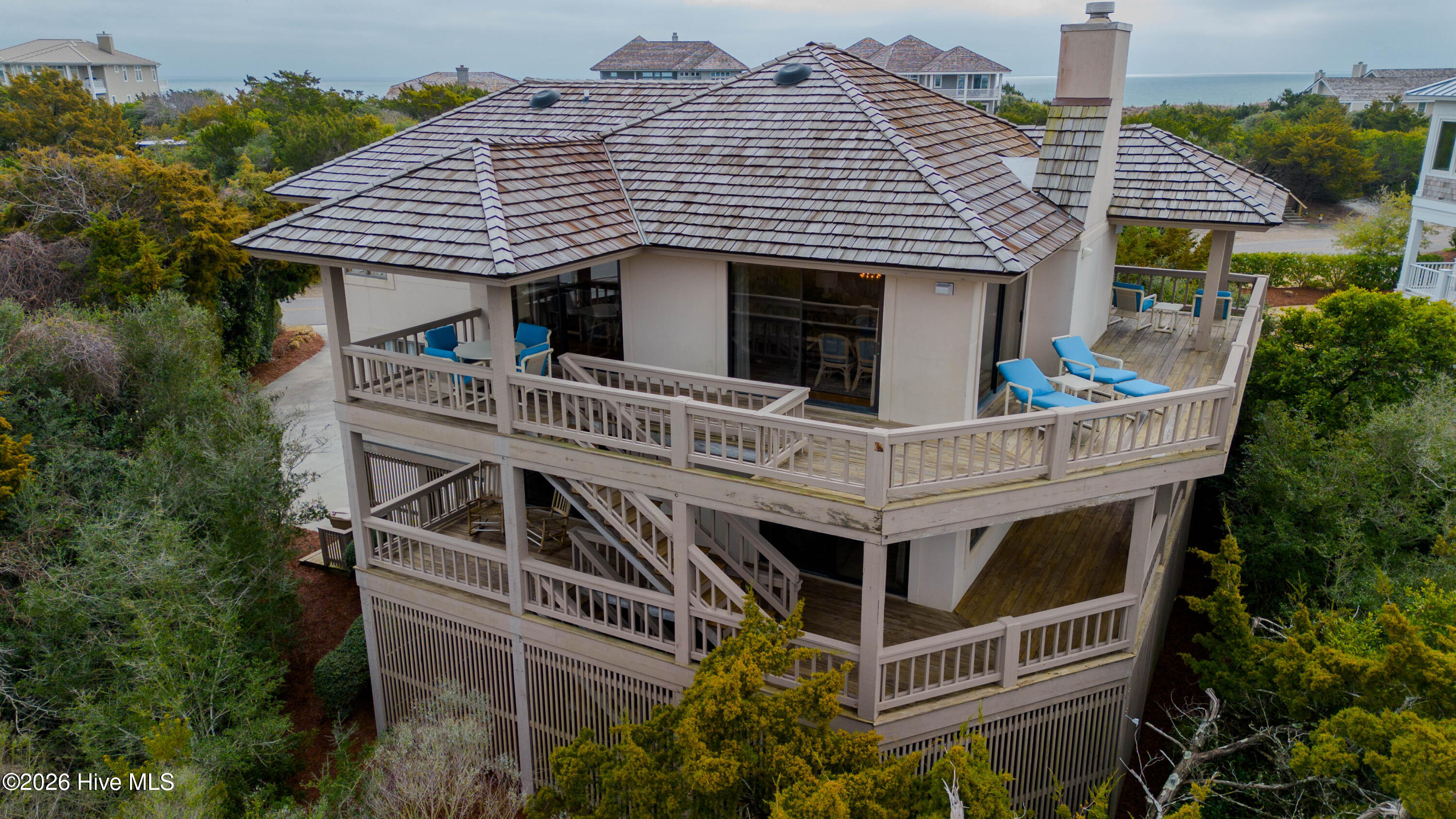 403 Beach Road North Wilmington, NC 28411 - Photo 3 of 26 Wraparound decks, giving views of the marsh and ocean.