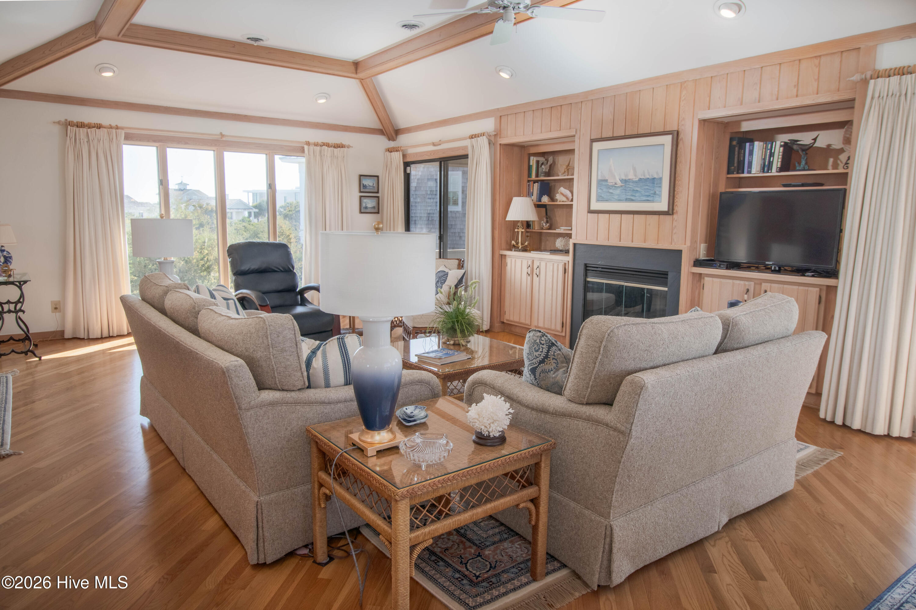 403 Beach Road North Wilmington, NC 28411 - Photo 5 of 26 Hardwoods and built-ins give that warm cozy beach feeling