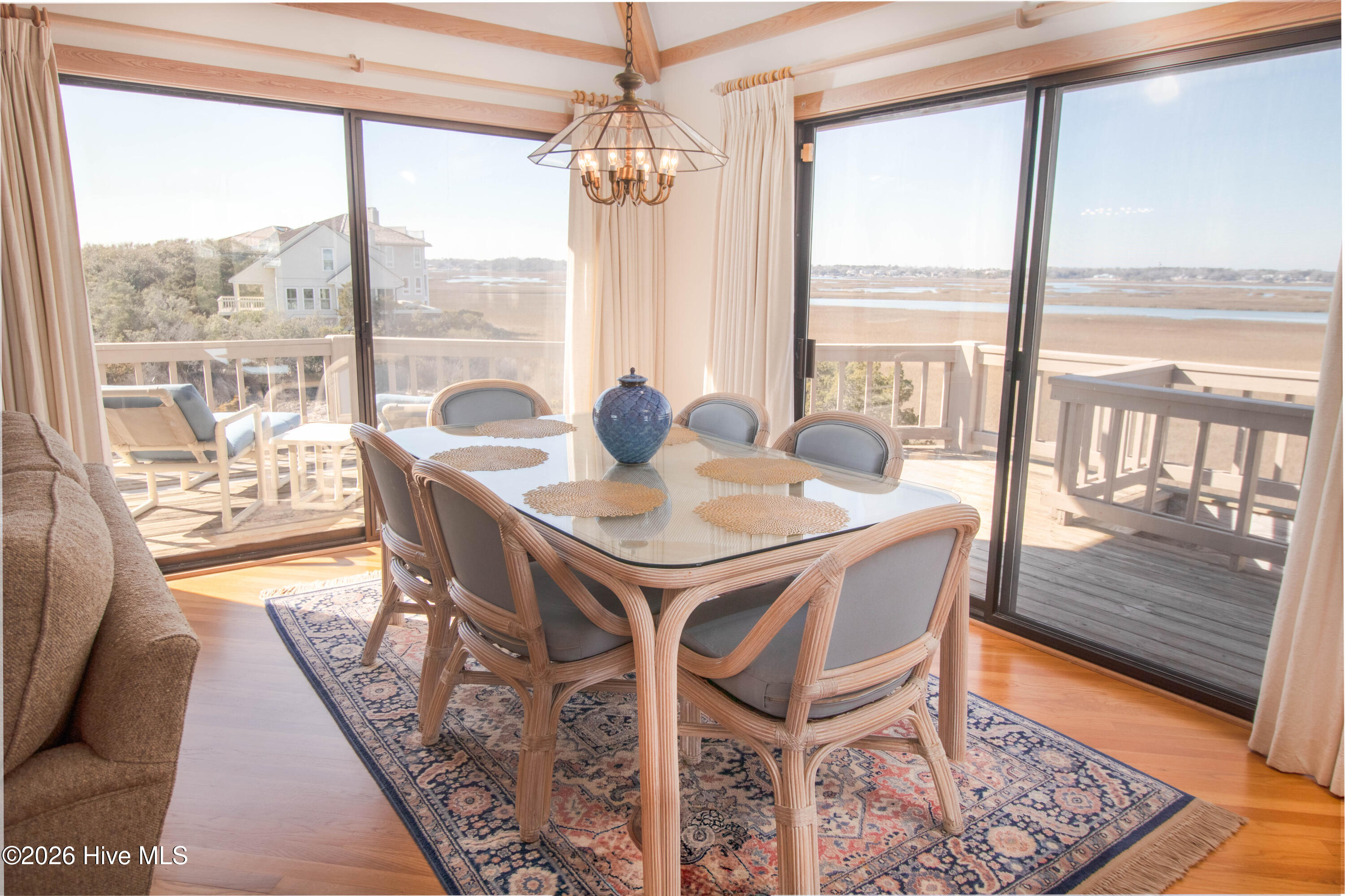 403 Beach Road North Wilmington, NC 28411 - Photo 8 of 26 Dining overlooking long range views of the marsh, ICW etc.