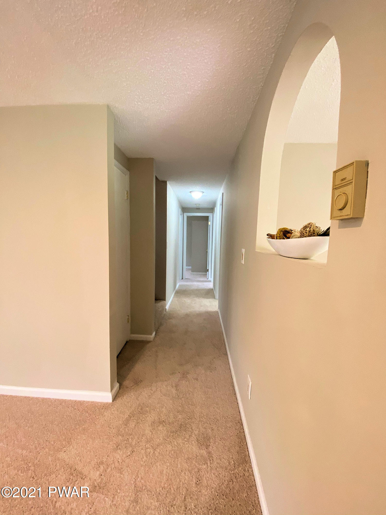 154 Heather Hill Road Dingmans Ferry, PA 18328 - Photo 4 of 58 4 Lower Level Hallway to Bedrooms-Bathro