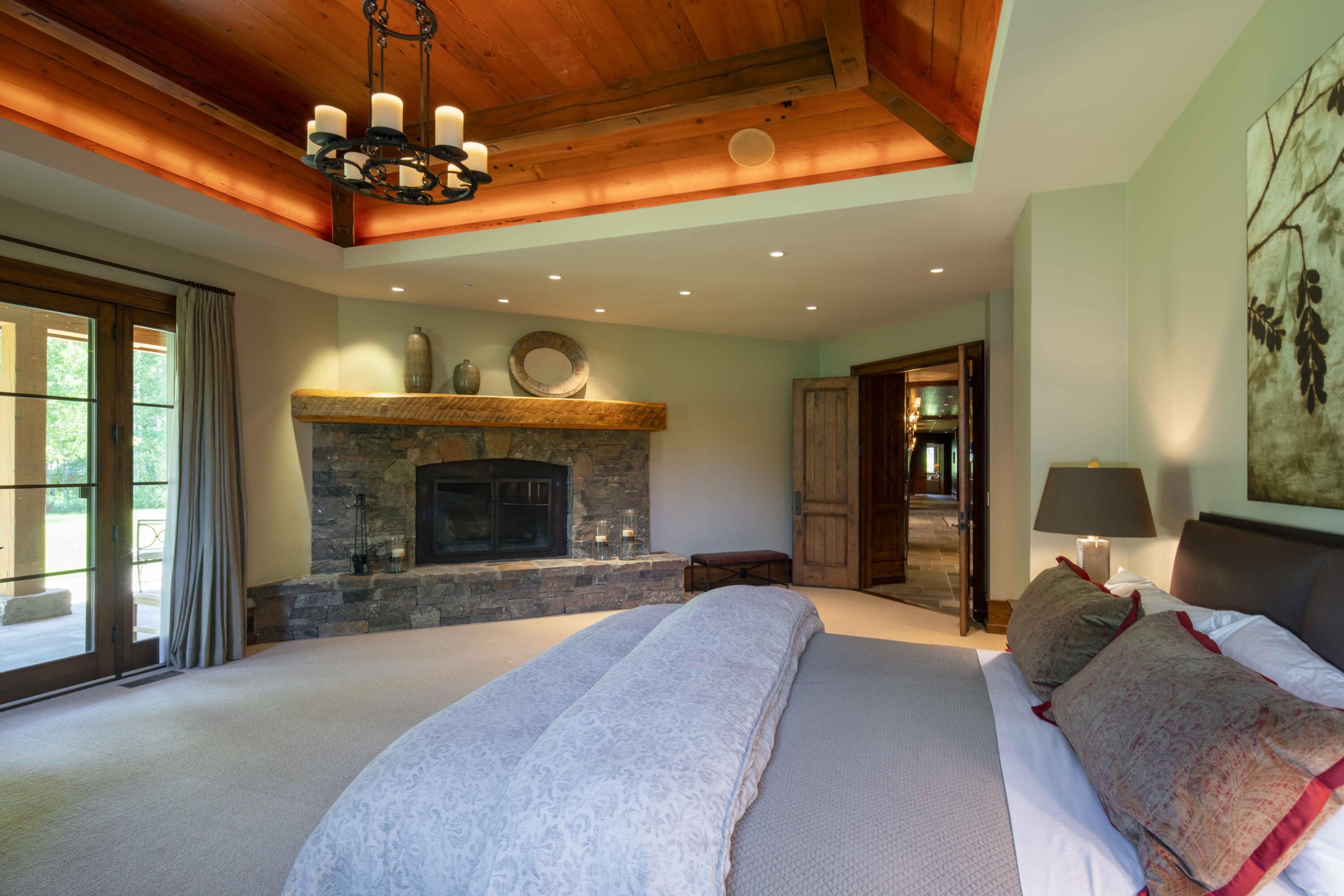 40 Fox Hollow Gulch Road Blaine County, ID 83313 - Photo 22 of 53 Primary Bedroom Fireplace
