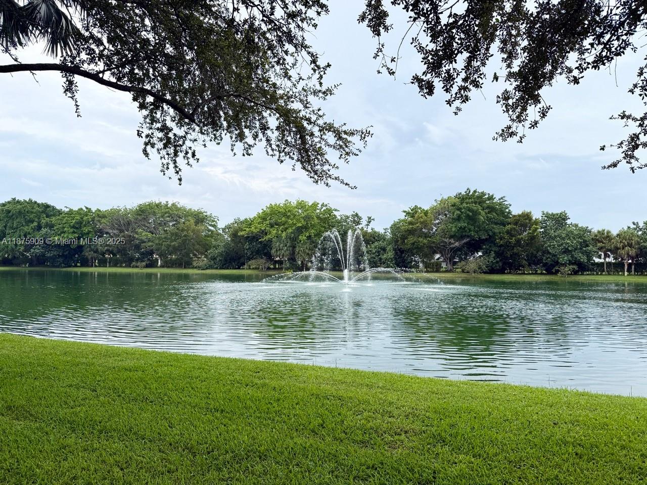 8658 Vía Reale, Unit 3 Boca Raton, FL 33496 - Photo 2 of 39 a view of a lake