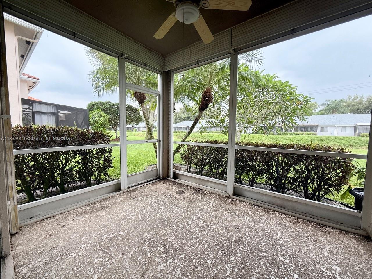 8658 Vía Reale, Unit 3 Boca Raton, FL 33496 - Photo 21 of 39 a view of a porch with wooden floor and outdoor space