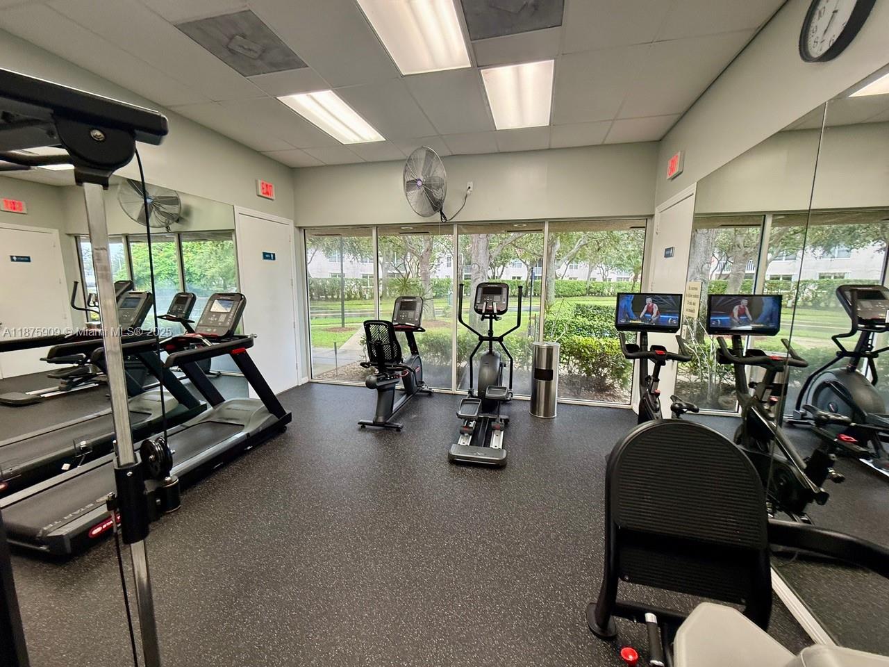8658 Vía Reale, Unit 3 Boca Raton, FL 33496 - Photo 28 of 39 a view of a room with gym equipment