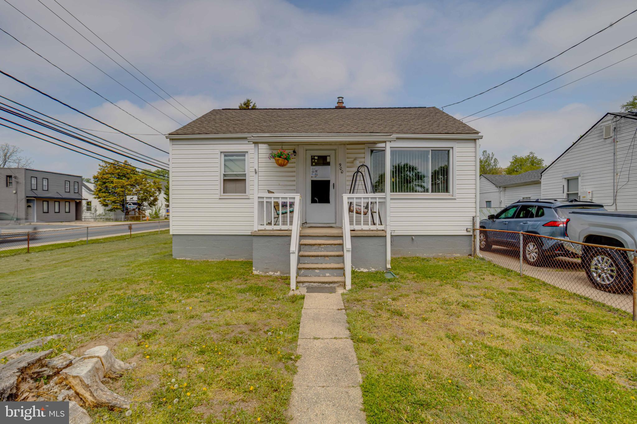 a front view of house with outdoor space