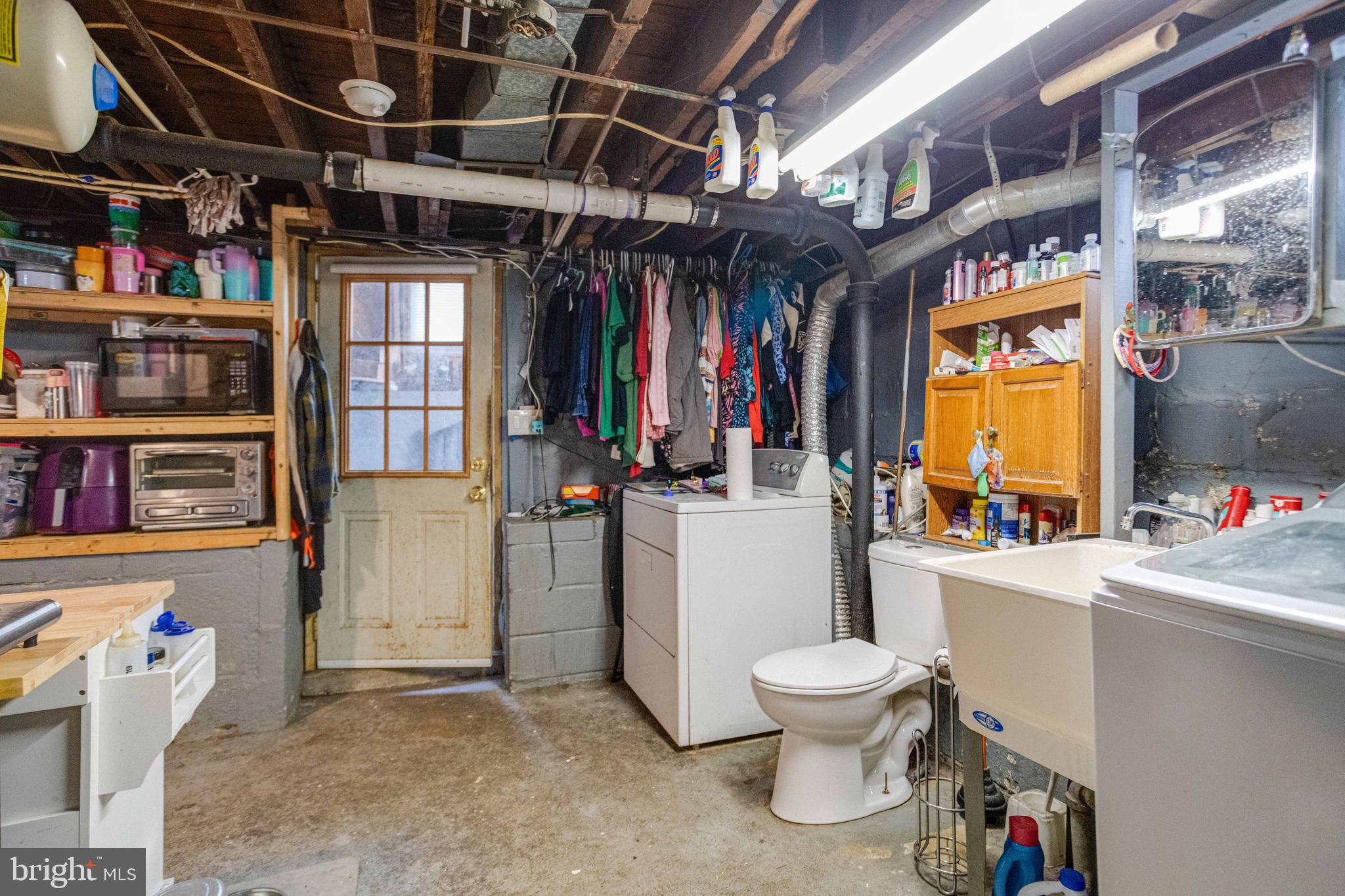 900 Renfrew Street Baltimore, MD 21221 - Photo 34 of 40 a room with storage and utility