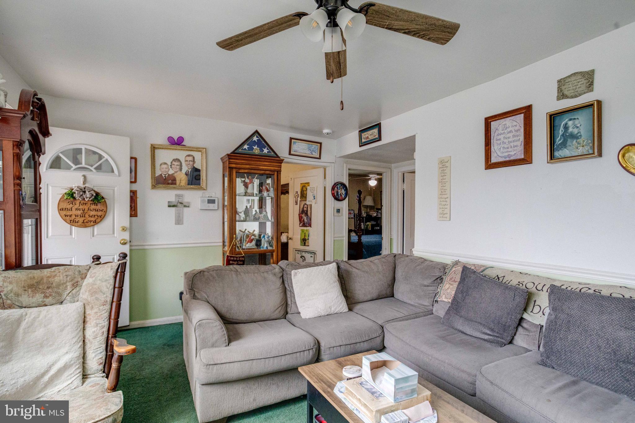 900 Renfrew Street Baltimore, MD 21221 - Photo 10 of 40 a living room with furniture and a couch