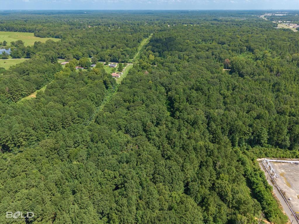 0 Bledsoe Road Keithville, LA 71047 - Photo 8 of 12 Aerial overview of property's location featuring a heavily wooded area