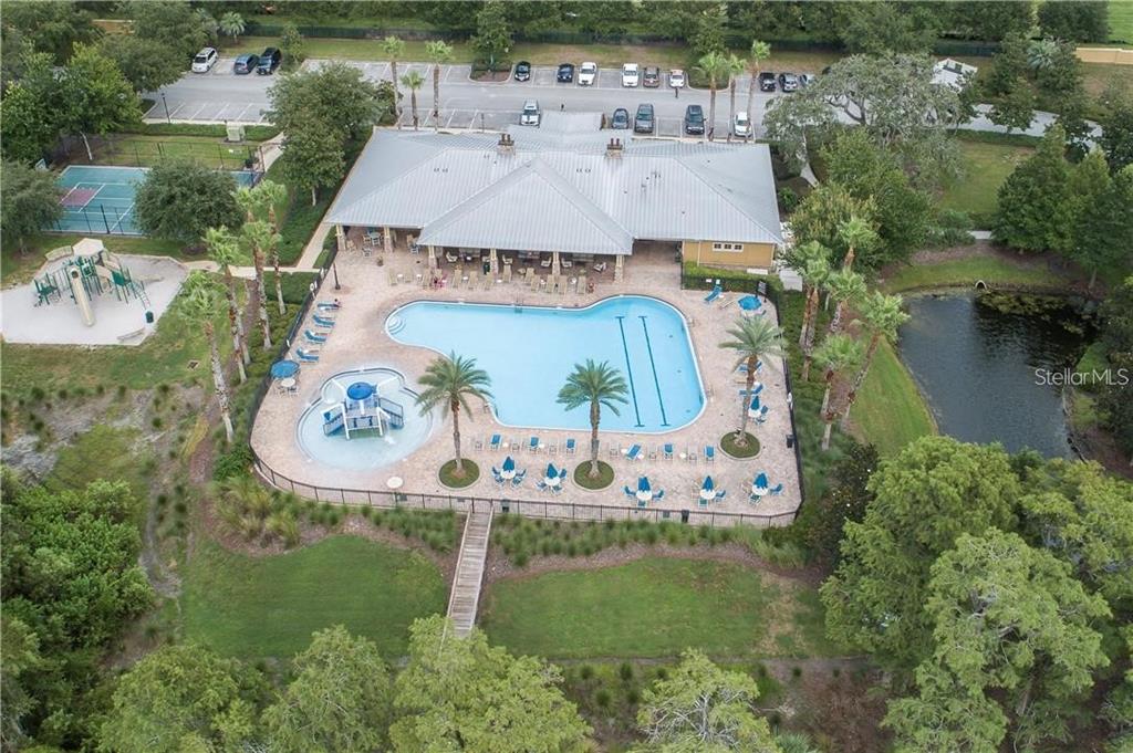 11919 Essington Street New Port Richey, FL 34654 - Photo 42 of 46 an aerial view of a house with outdoor space