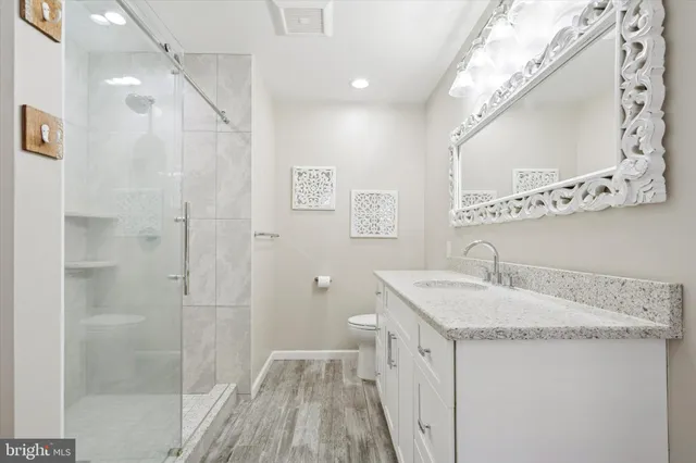 a bathroom with a sink a vanity and a mirror
