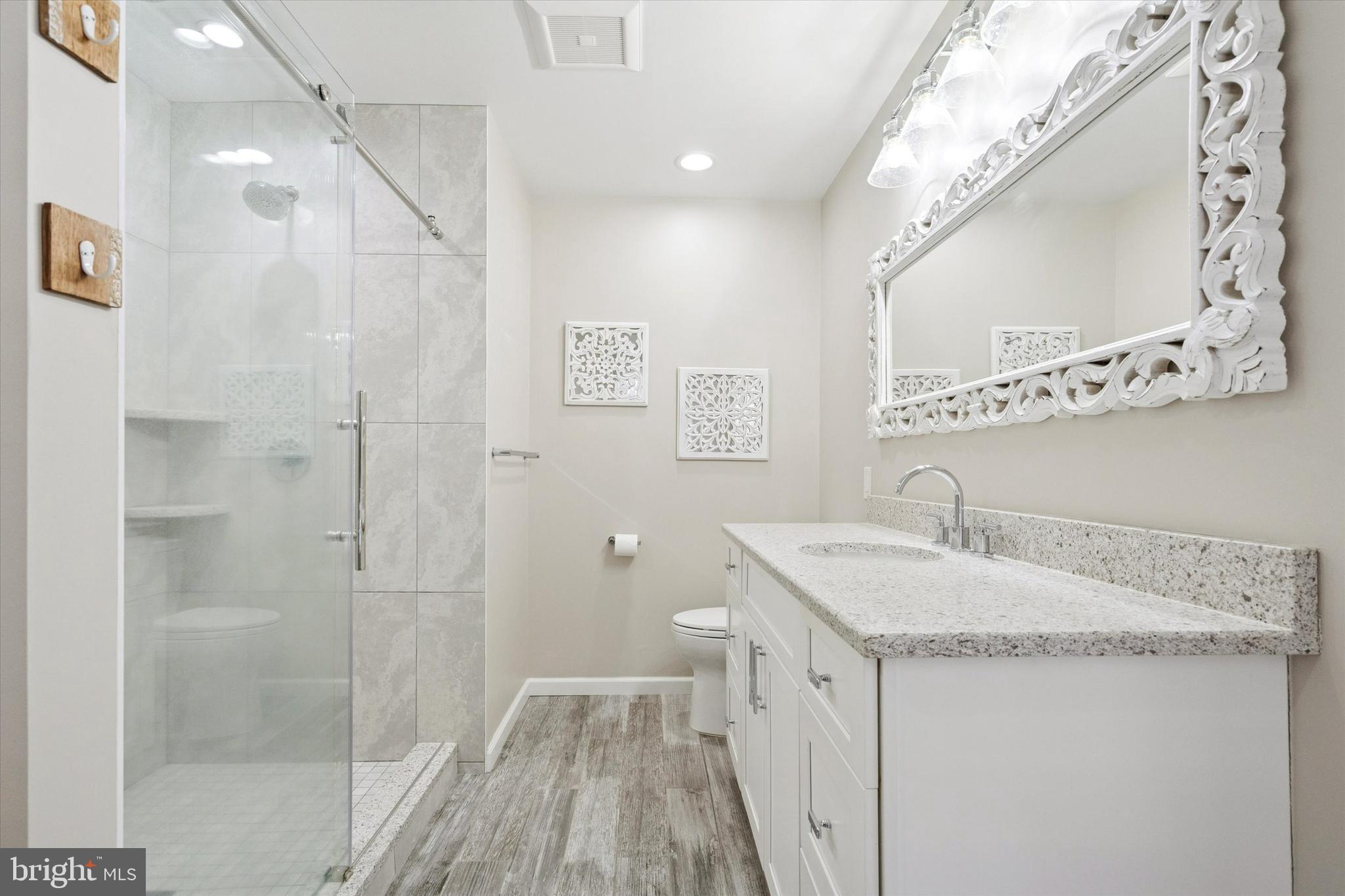 6 Edison Lane Doylestown, PA 18901 - Photo 21 of 41 a bathroom with a sink a vanity and a mirror