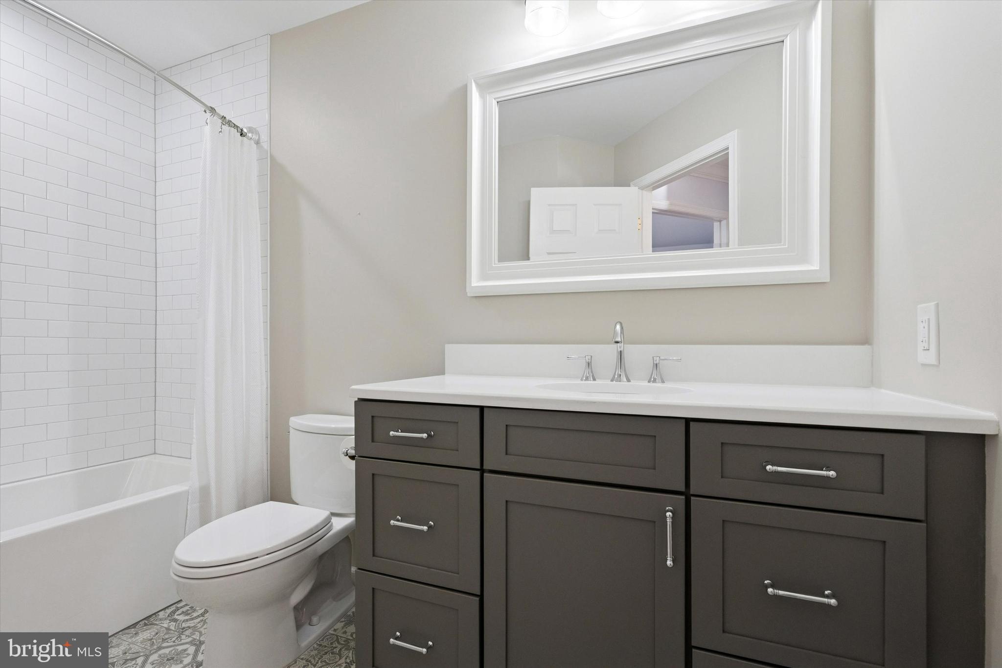 6 Edison Lane Doylestown, PA 18901 - Photo 24 of 41 a bathroom with a sink toilet vanity and tub