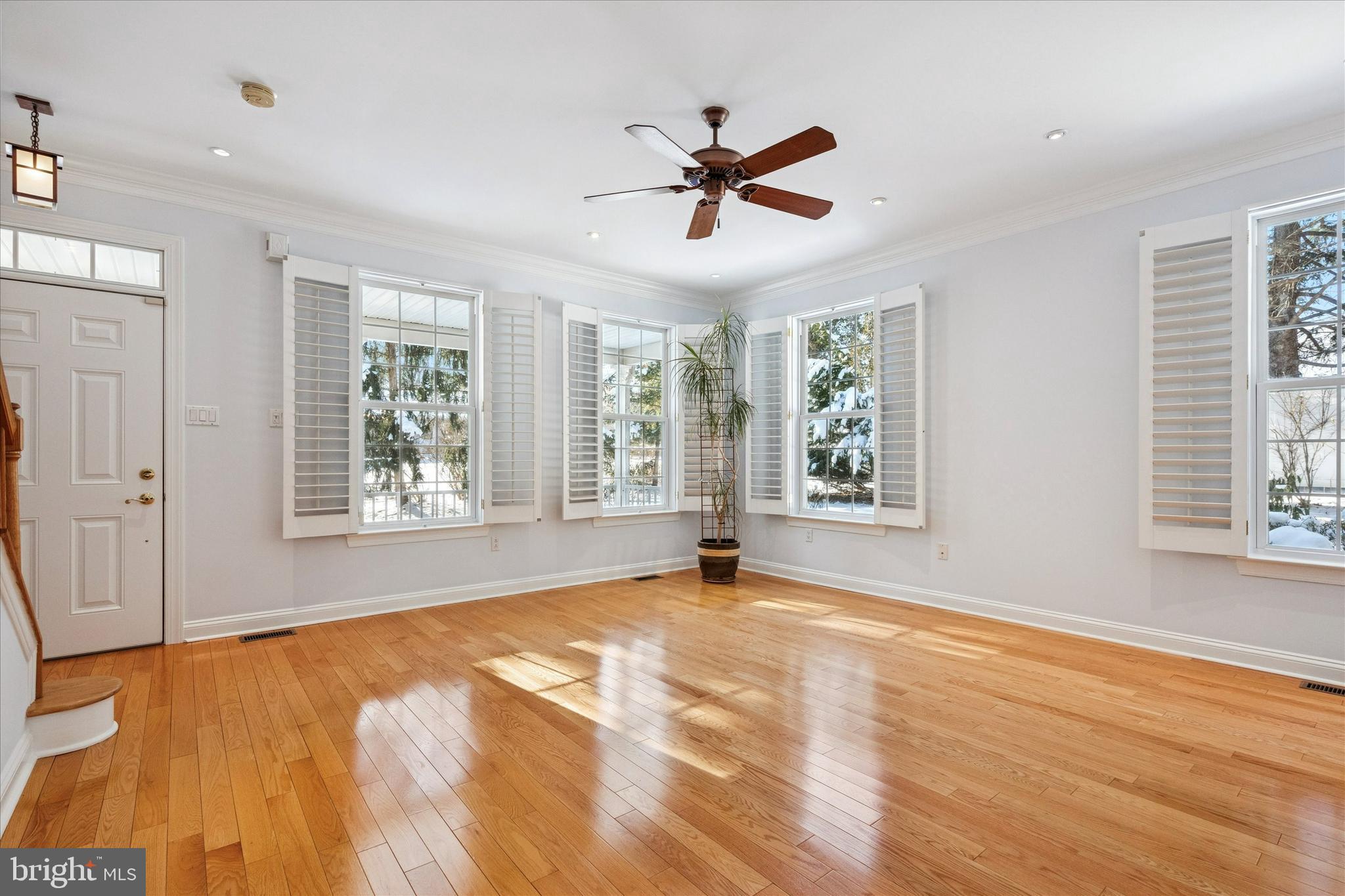 6 Edison Lane Doylestown, PA 18901 - Photo 6 of 41 a view of an empty room with a window and wooden floor