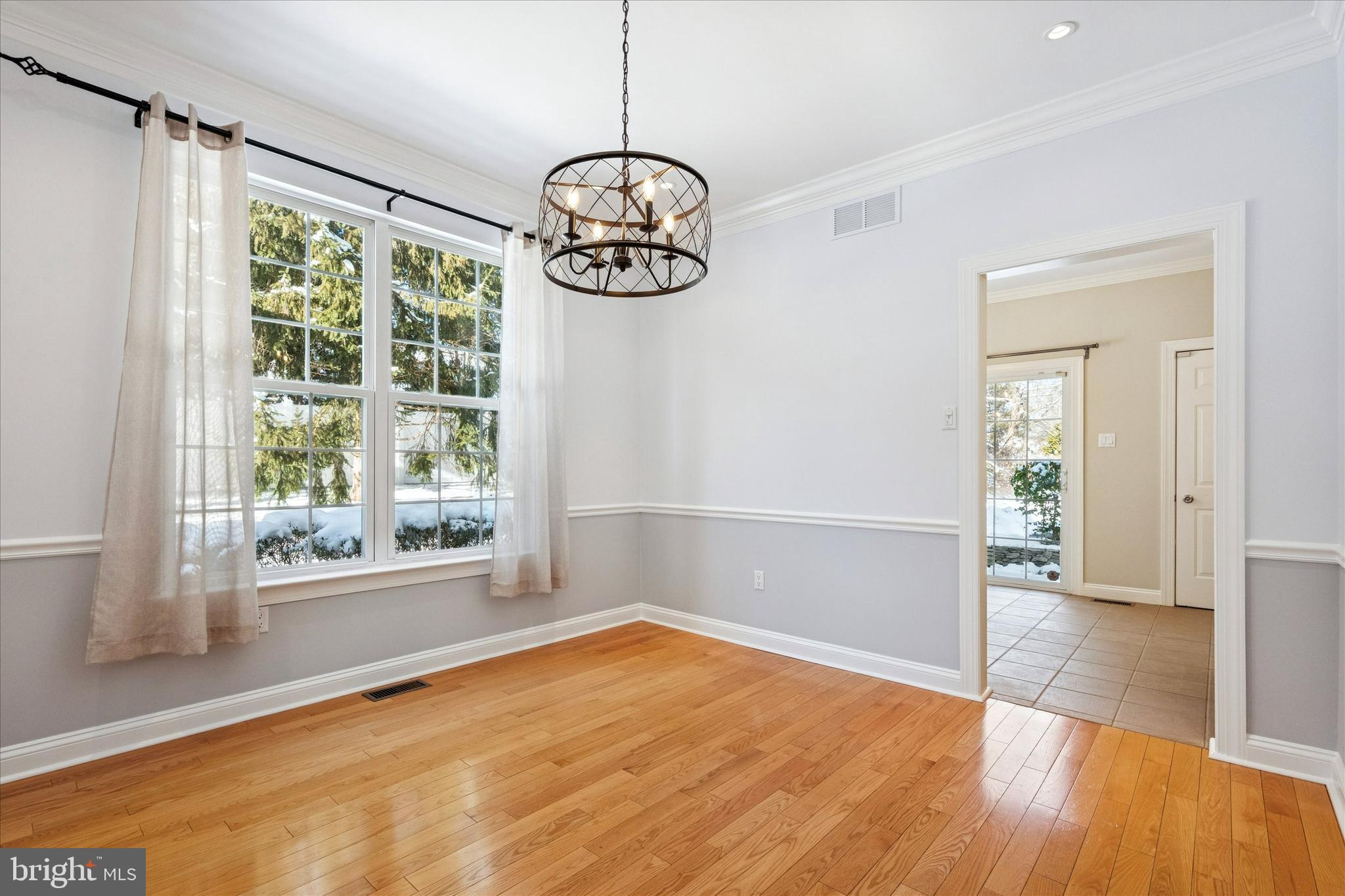 6 Edison Lane Doylestown, PA 18901 - Photo 8 of 41 a view of empty room with wooden floor and fan