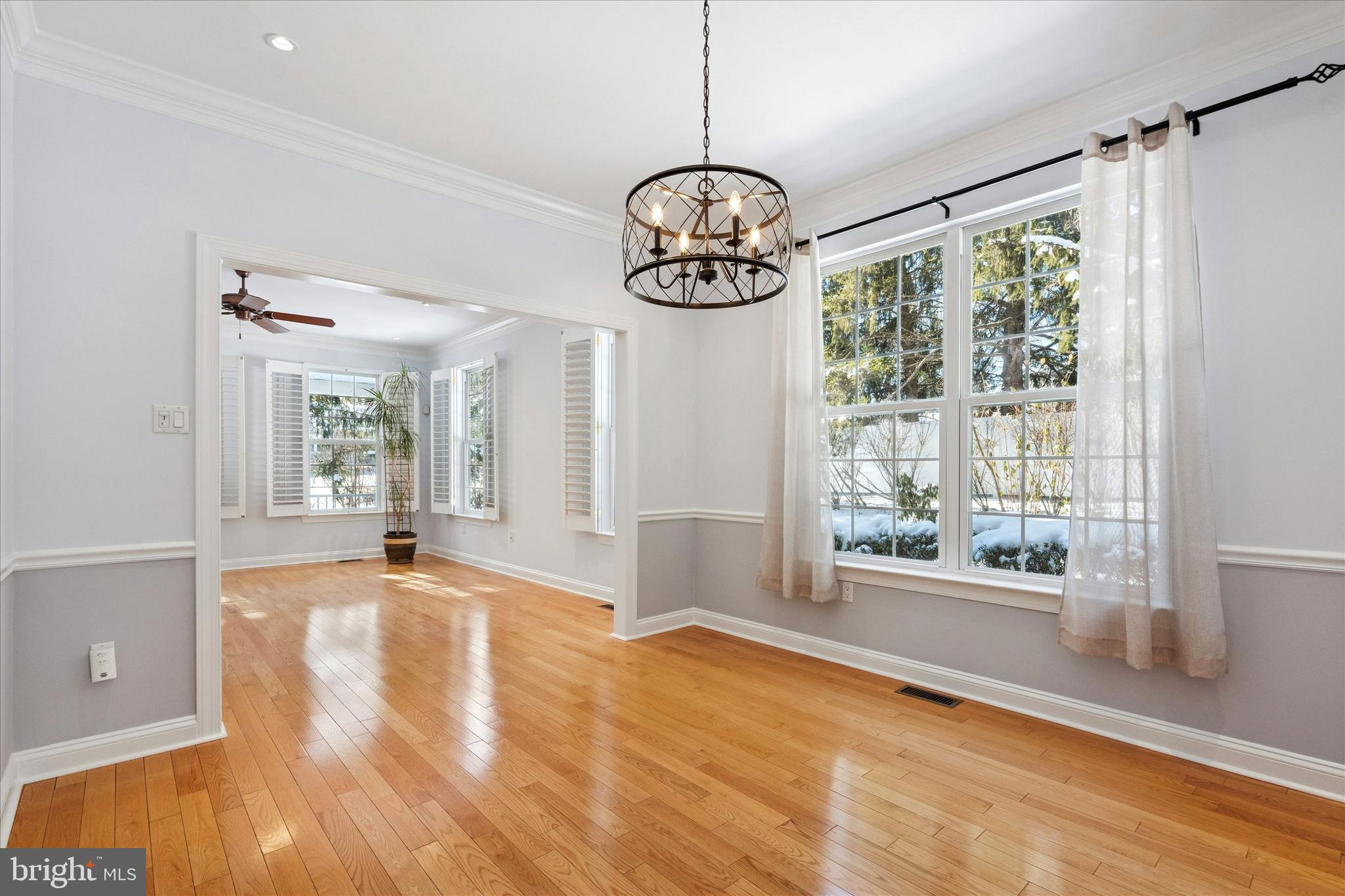 6 Edison Lane Doylestown, PA 18901 - Photo 9 of 41 a view of an empty room with wooden floor and a window