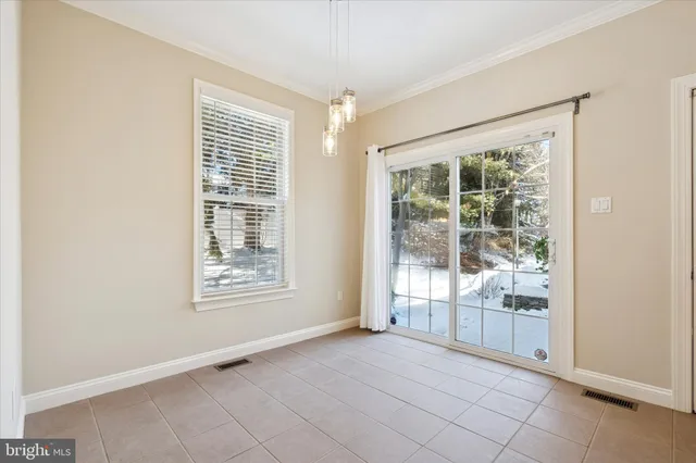 an empty room with windows