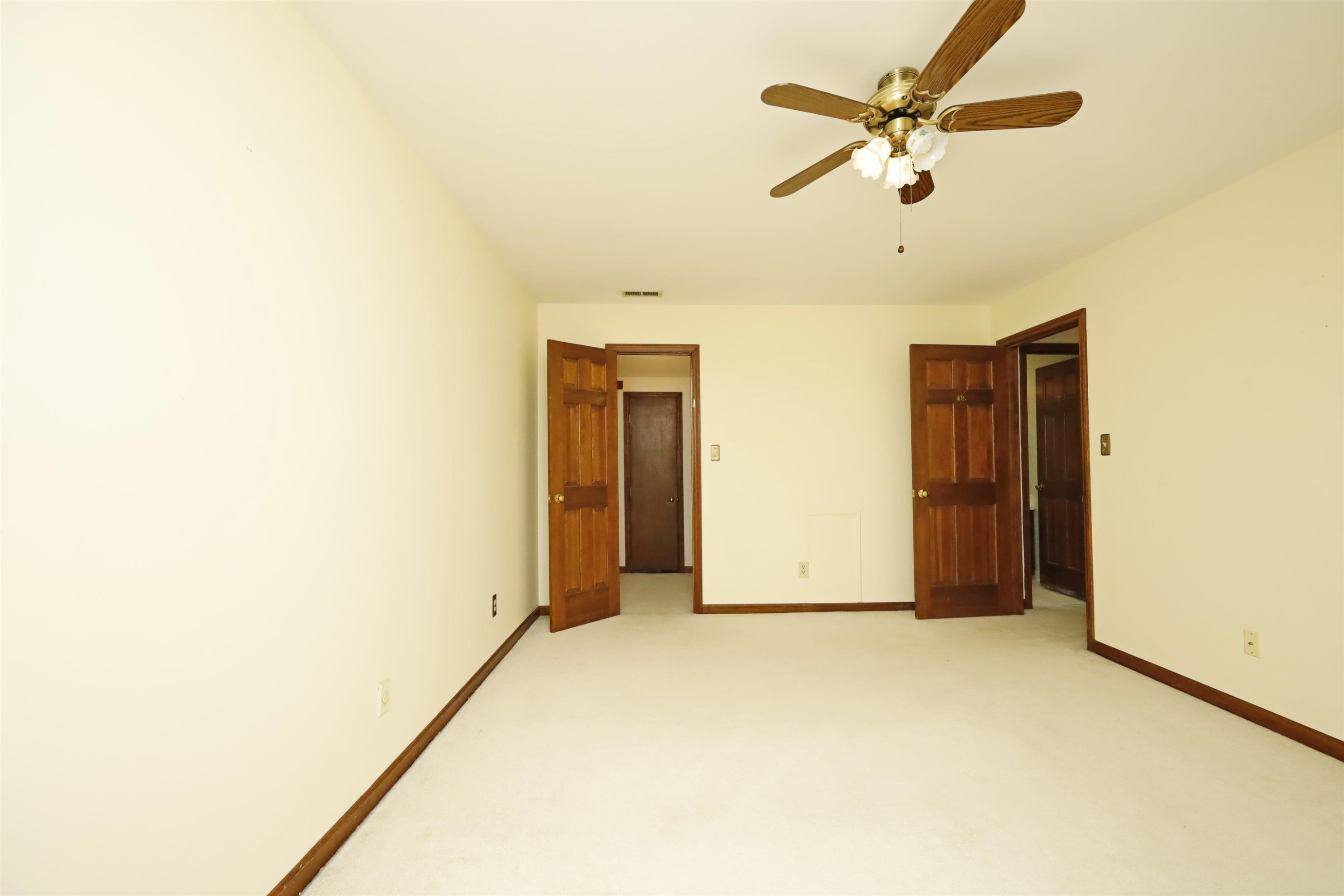 924 Albany Court Raleigh, NC 27615 - Photo 23 of 33 a view of a livingroom with a ceiling fan and window