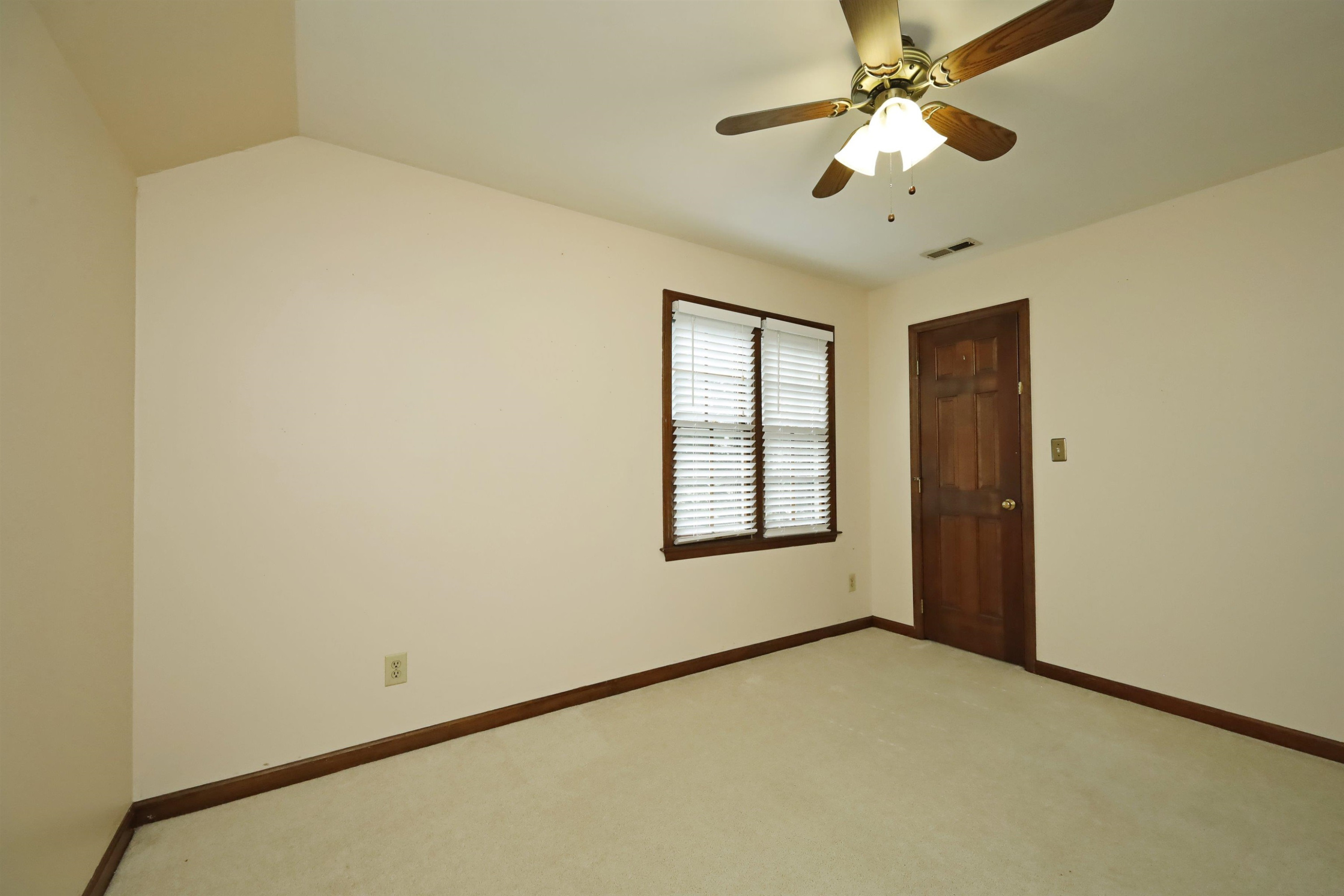 924 Albany Court Raleigh, NC 27615 - Photo 24 of 33 an empty room with windows and fan