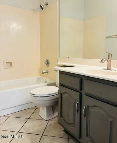 a view of an empty room and wooden floor
