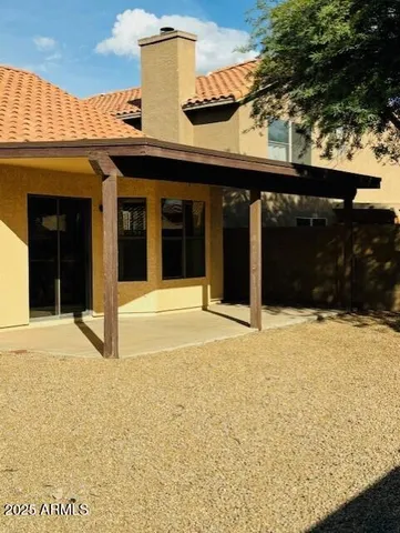 a blue sign that is on the side of a building