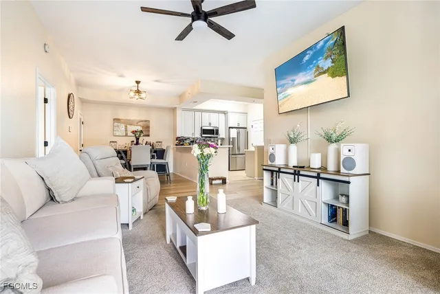 a balcony with table and chairs