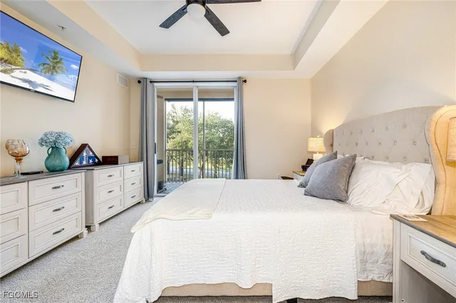 a bedroom with a bed and a cabinets