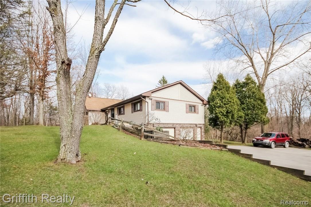 7304 North Latson Road Howell, MI 48855 - Photo 2 of 38 004-Front_View-2601769-medium.jpg