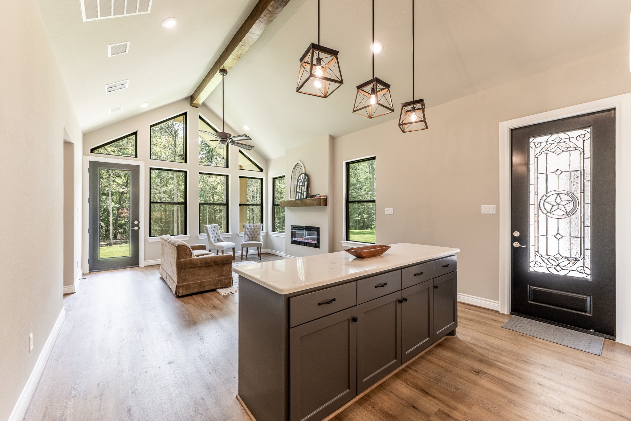 111 Eagle Run Road Willis, TX 77378 - Photo 30 of 44 Spacious and inviting family room perfect for relaxation and entertainment, featuring large windows for abundant natural light.