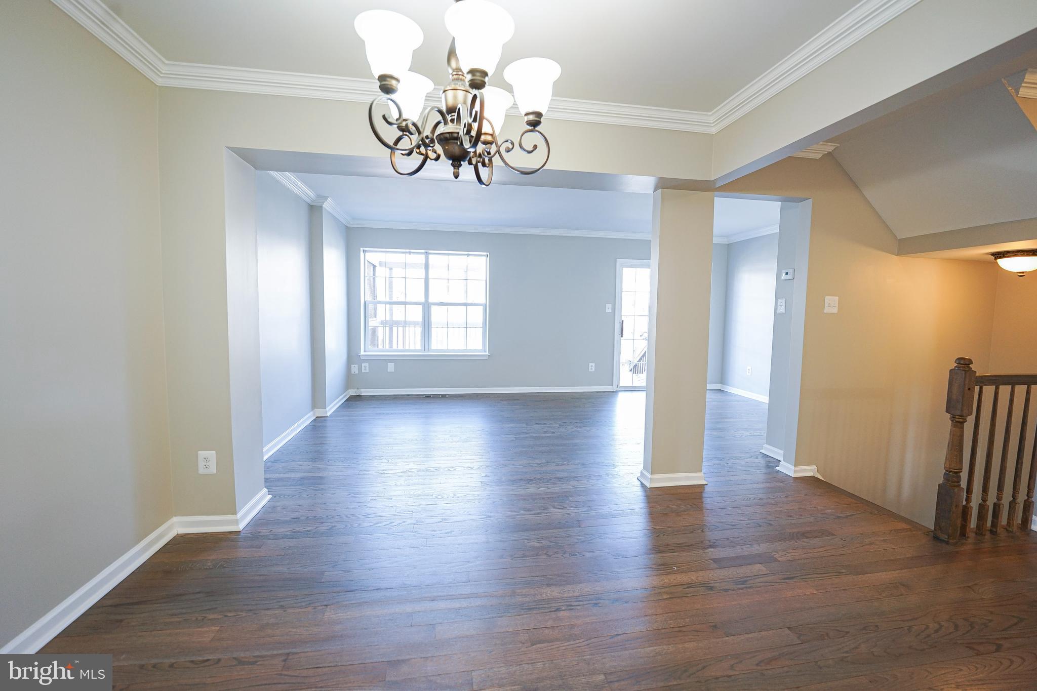 862 Vanderbilt Terrace Southeast Leesburg, VA 20175 - Photo 15 of 41 Family Dining Room with custom crown molding