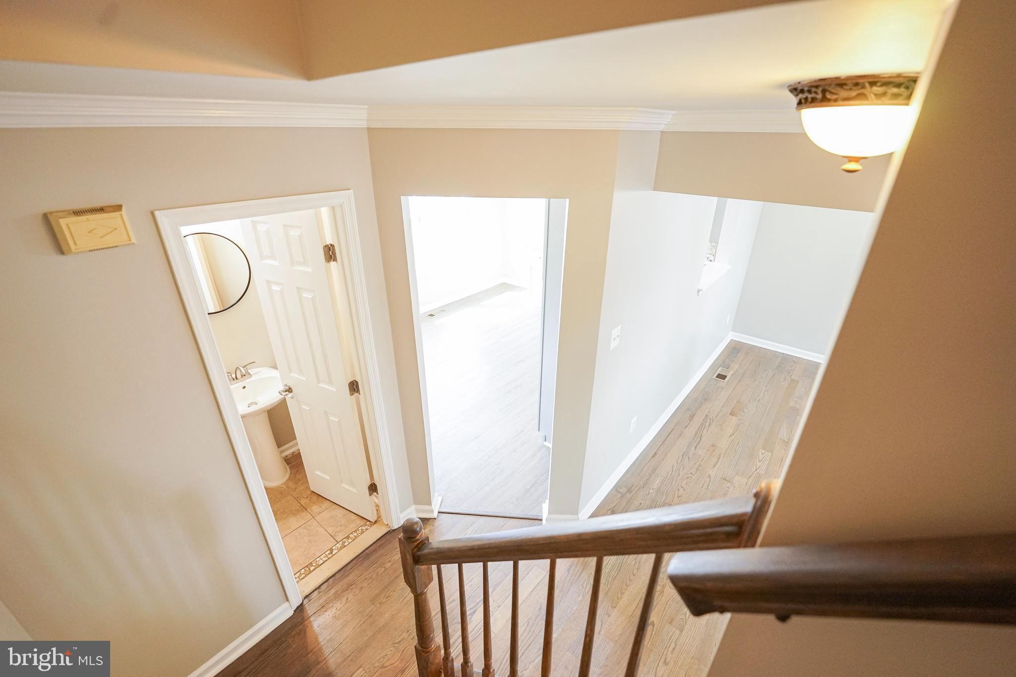 862 Vanderbilt Terrace Southeast Leesburg, VA 20175 - Photo 17 of 41 Wood Stairs throughout home