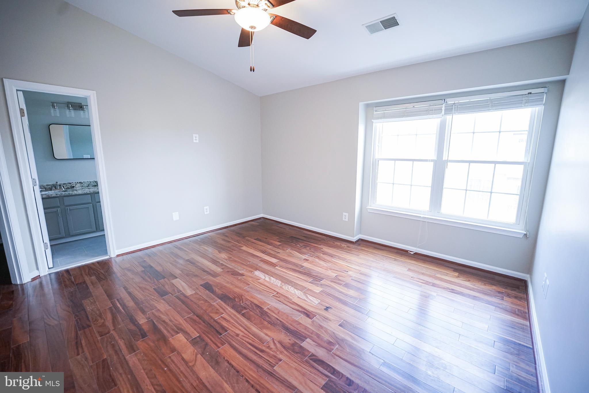 862 Vanderbilt Terrace Southeast Leesburg, VA 20175 - Photo 30 of 41 Beautifully lit Primary bedroom with new fan