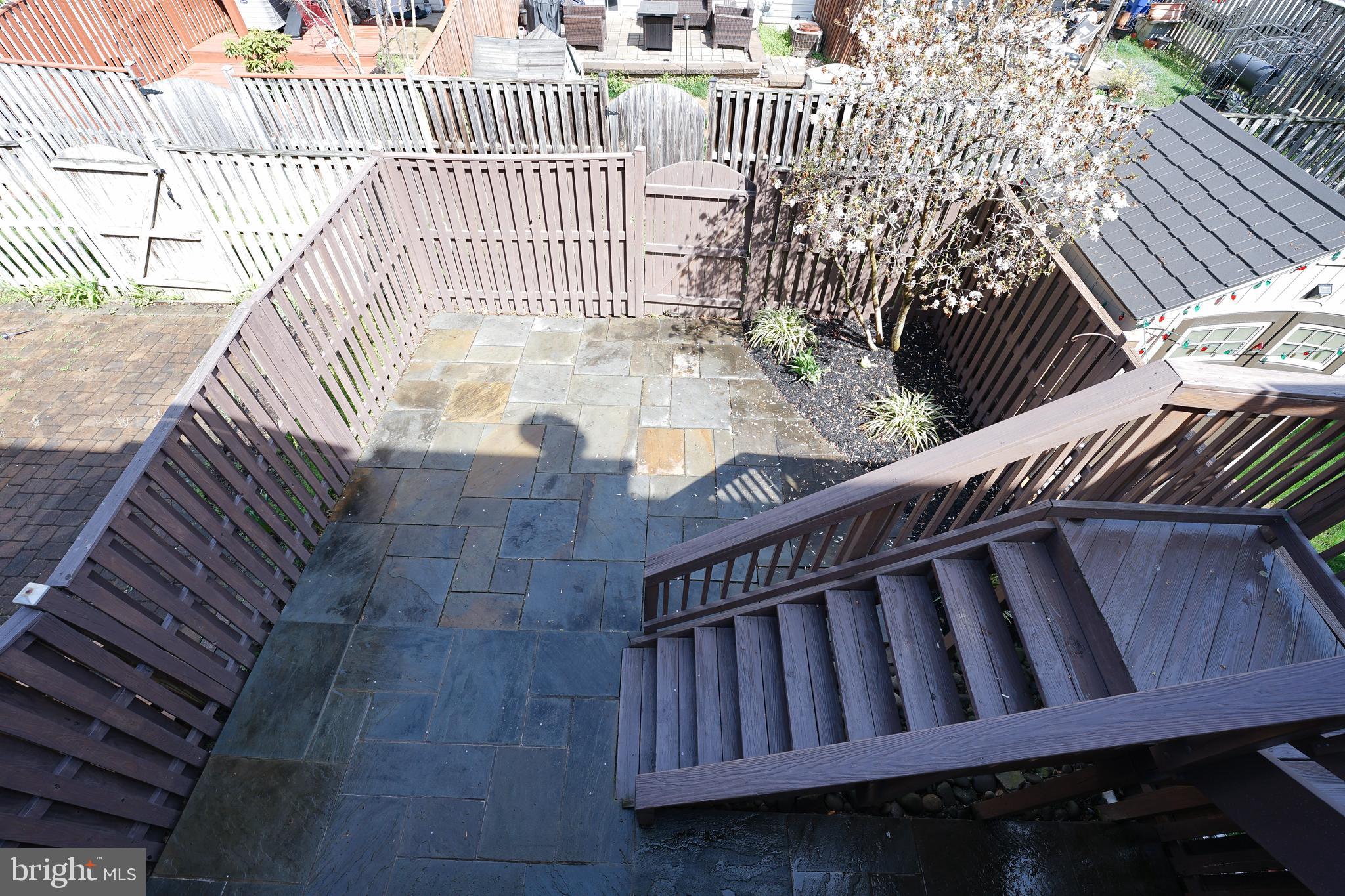 862 Vanderbilt Terrace Southeast Leesburg, VA 20175 - Photo 37 of 41 Prof built flagstone patio w/1 & 2nd floor access