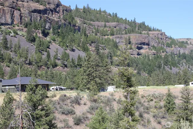 an aerial view of residential house with outdoor space