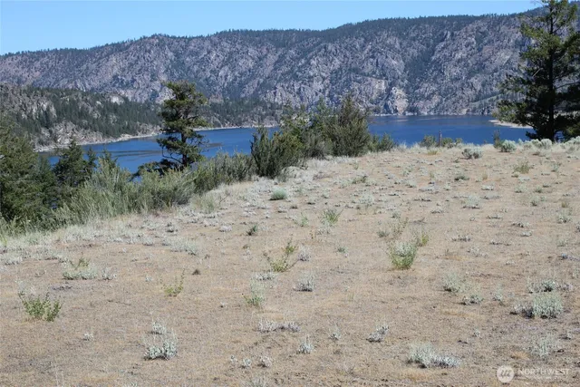 a view of house with a yard covered with snow