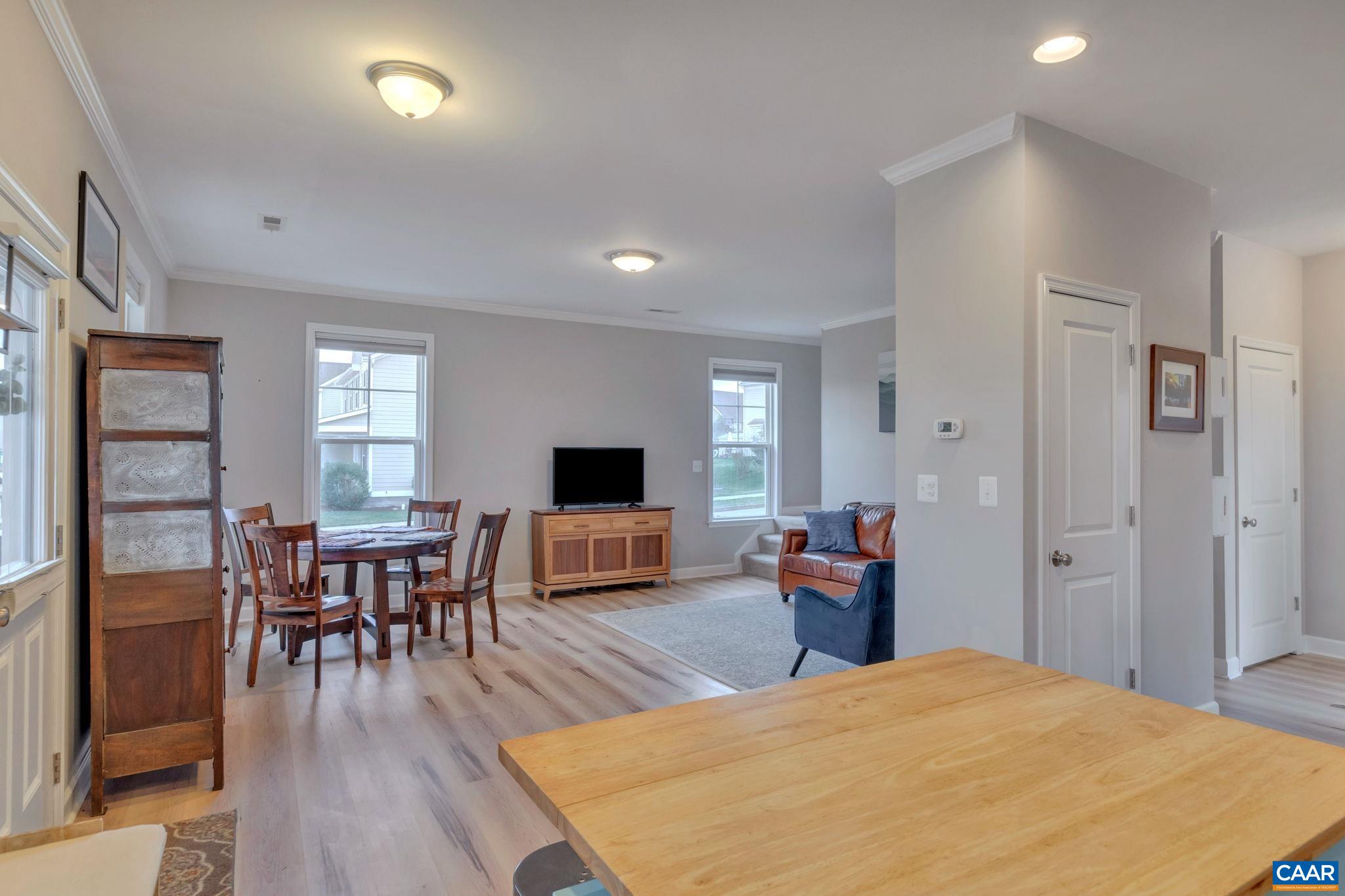 5543 Summerdean Road Crozet, VA 22932 - Photo 11 of 59 a bedroom with a bed and wooden floor
