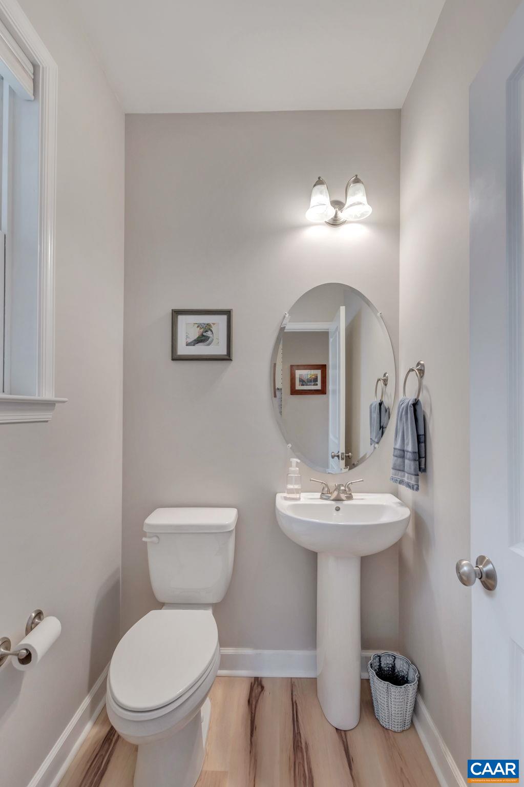5543 Summerdean Road Crozet, VA 22932 - Photo 15 of 59 a bathroom with a toilet sink and mirror