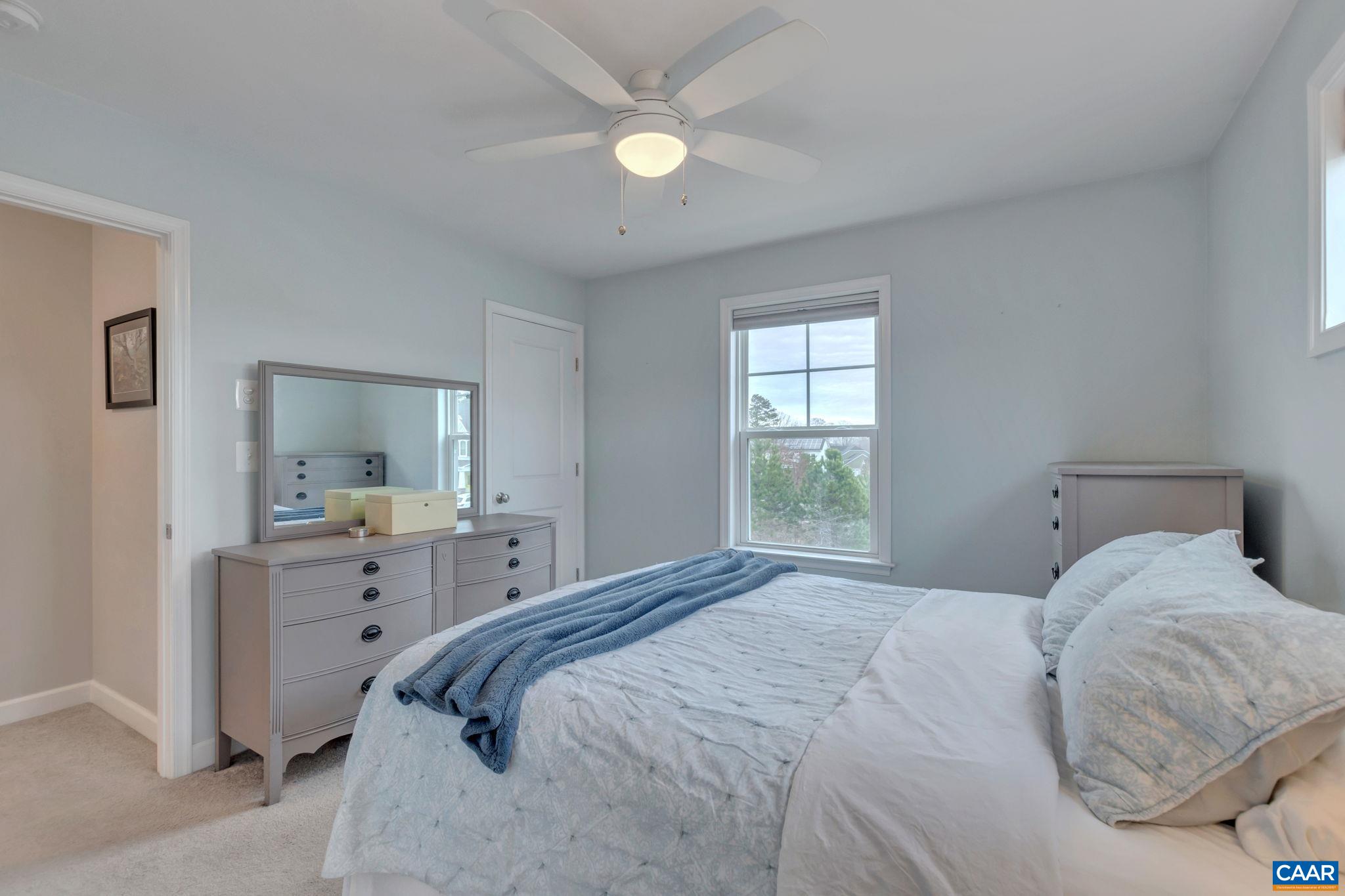 5543 Summerdean Road Crozet, VA 22932 - Photo 17 of 59 a bedroom with a bed and a window