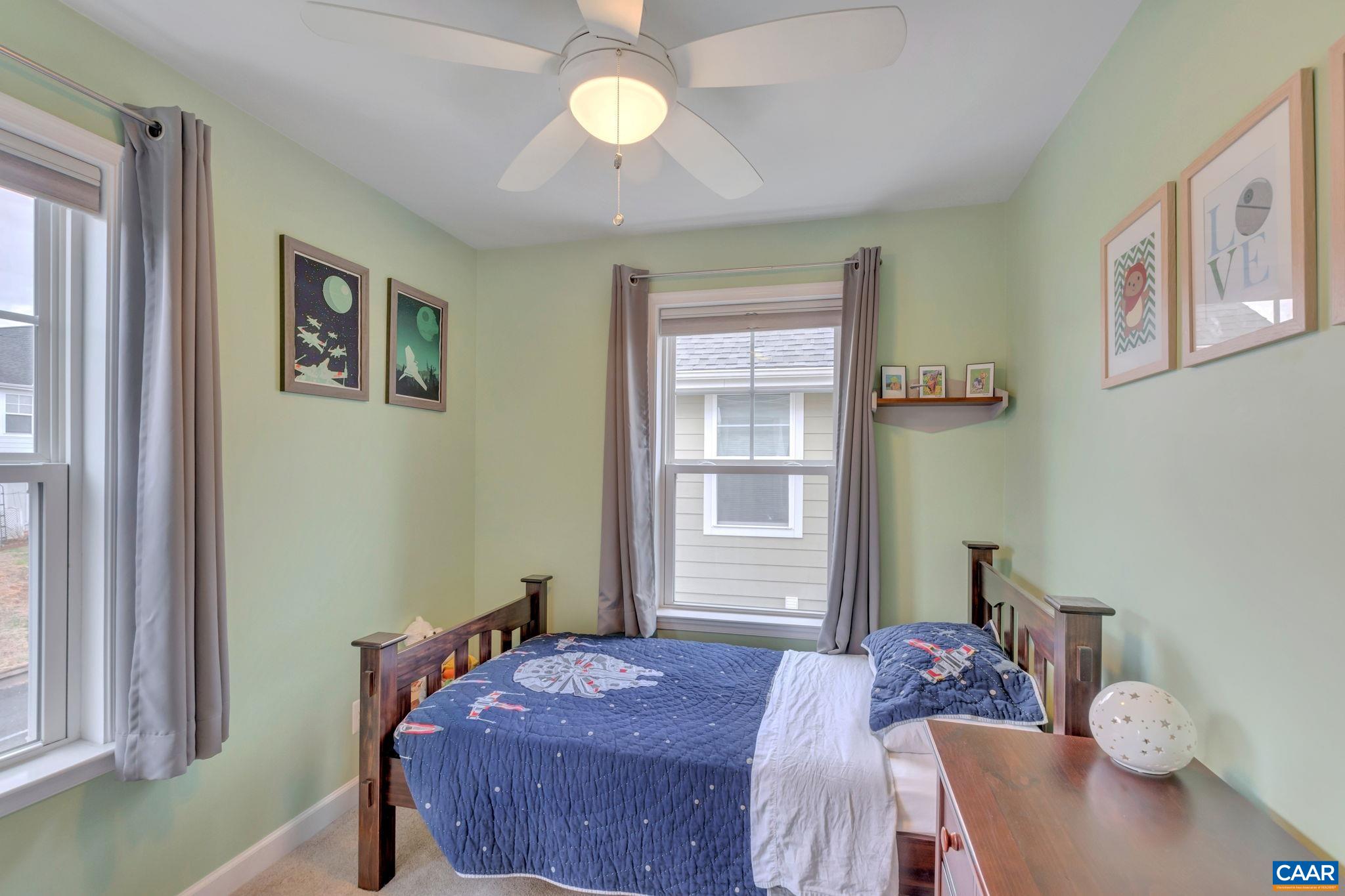 5543 Summerdean Road Crozet, VA 22932 - Photo 20 of 59 a bedroom with a bed and a window