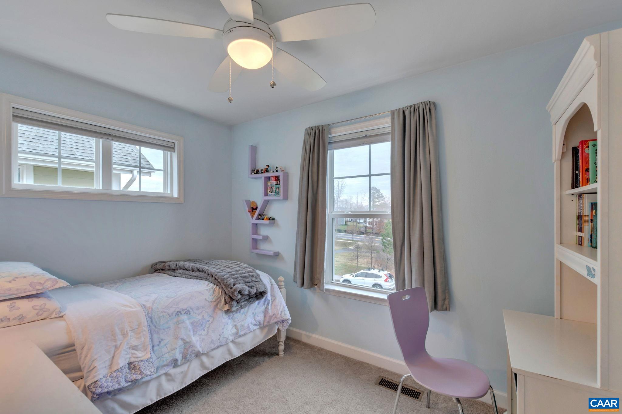 5543 Summerdean Road Crozet, VA 22932 - Photo 21 of 59 a bedroom with a bed and a window