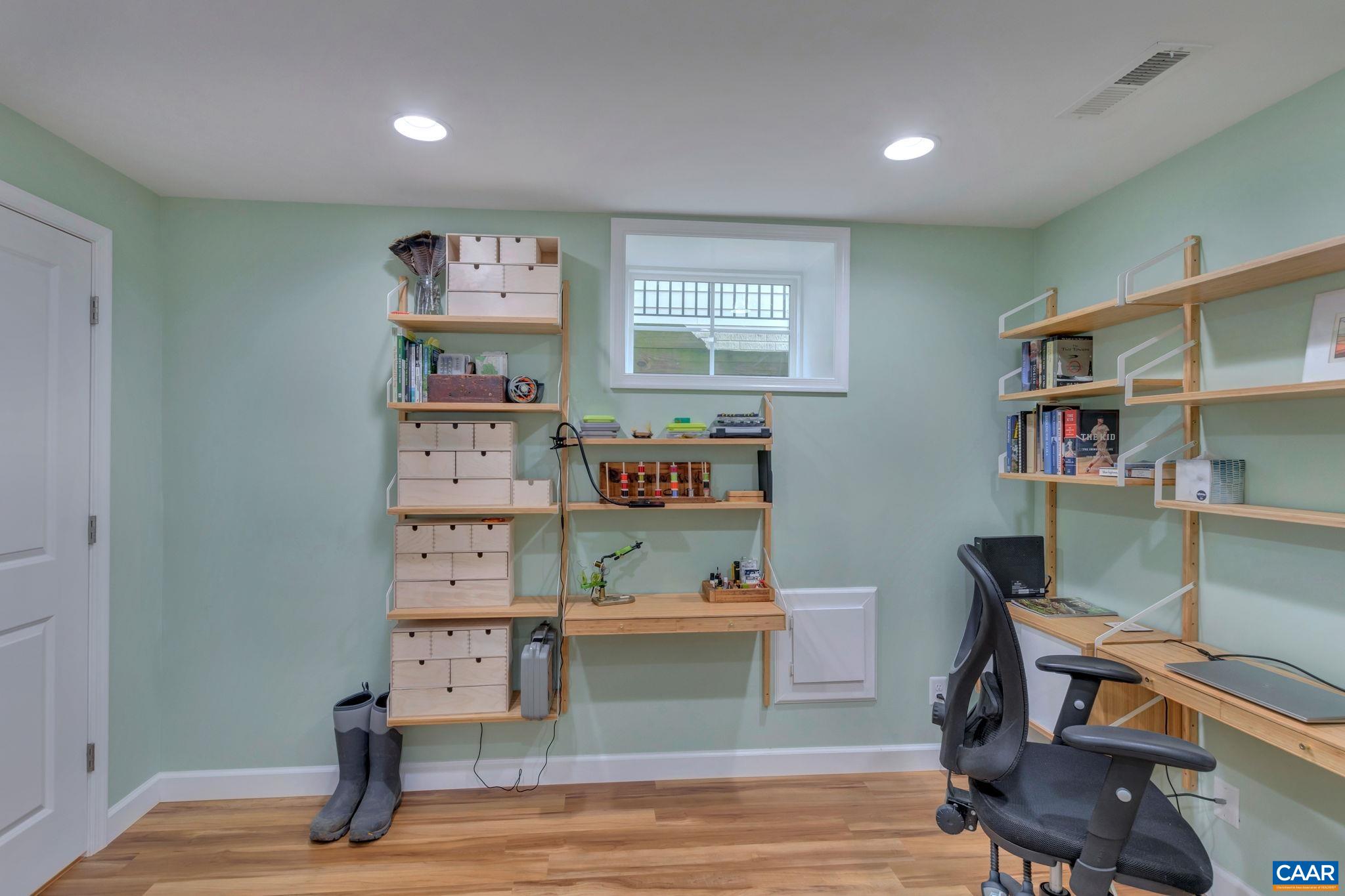 5543 Summerdean Road Crozet, VA 22932 - Photo 29 of 59 a view of a workspace with furniture and wooden floor