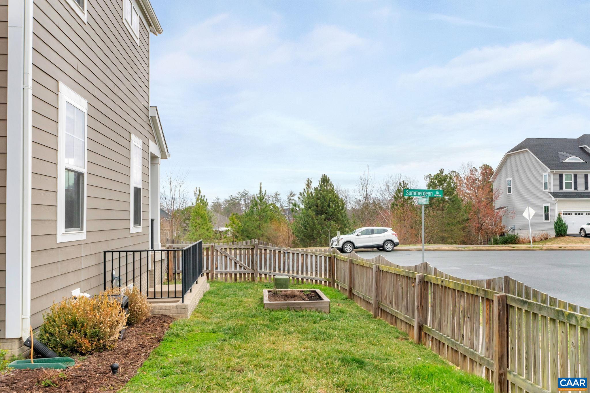 5543 Summerdean Road Crozet, VA 22932 - Photo 36 of 59 a house view with a garden space